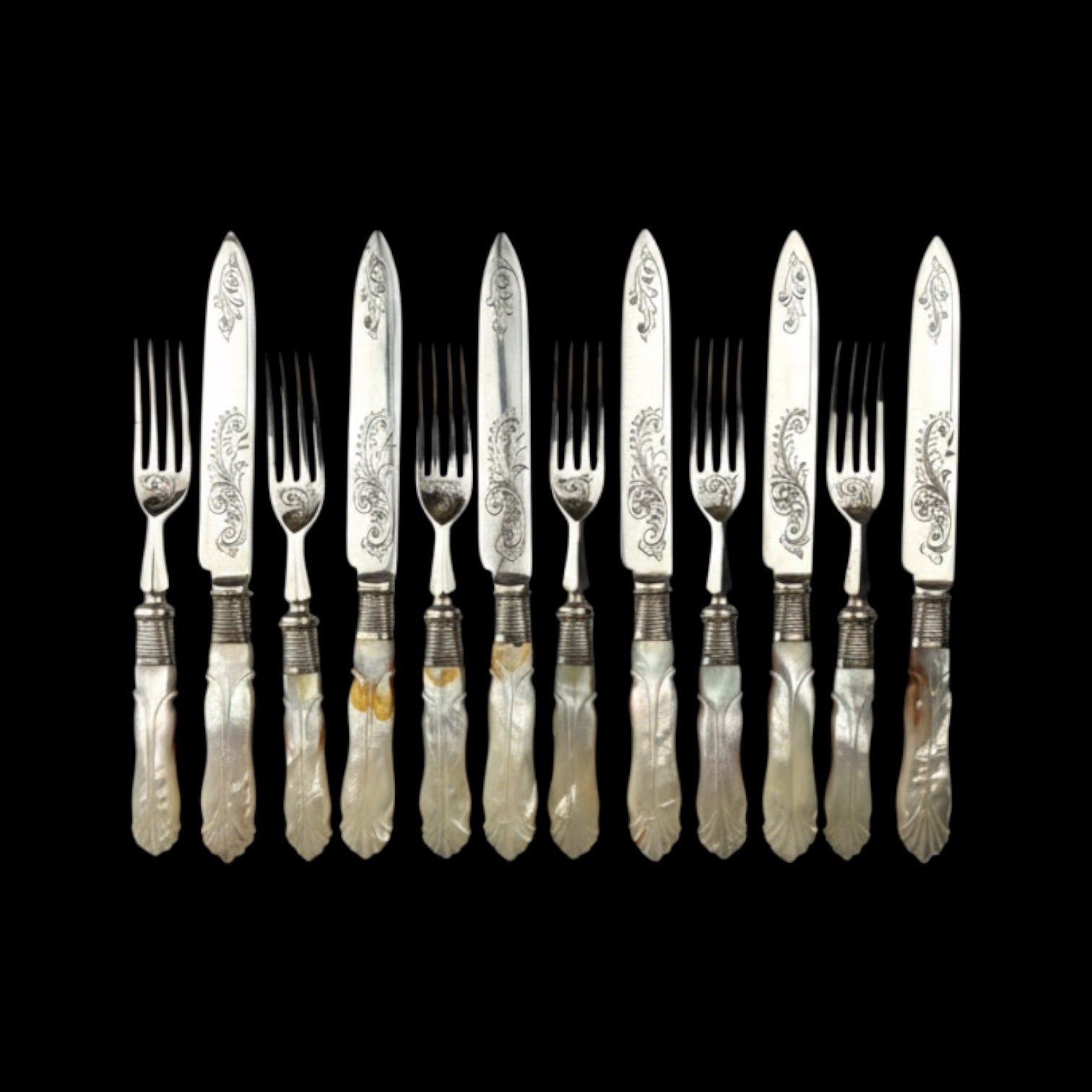 Cutlery Set. Mother of Pearl and Silver Plate. Circa 1900.