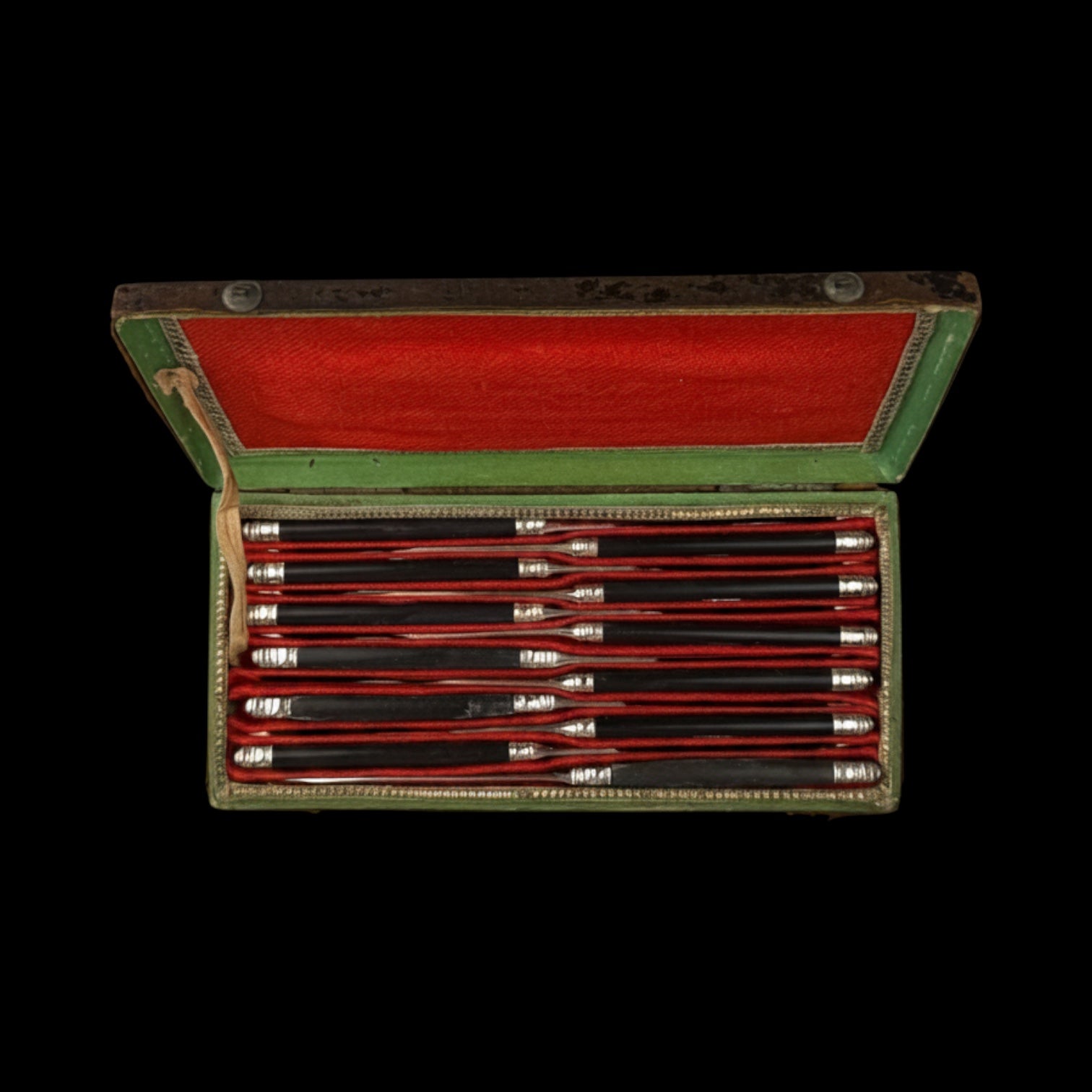 French Ebony and Silver Knife Set. Circa 1830-50. Cased.