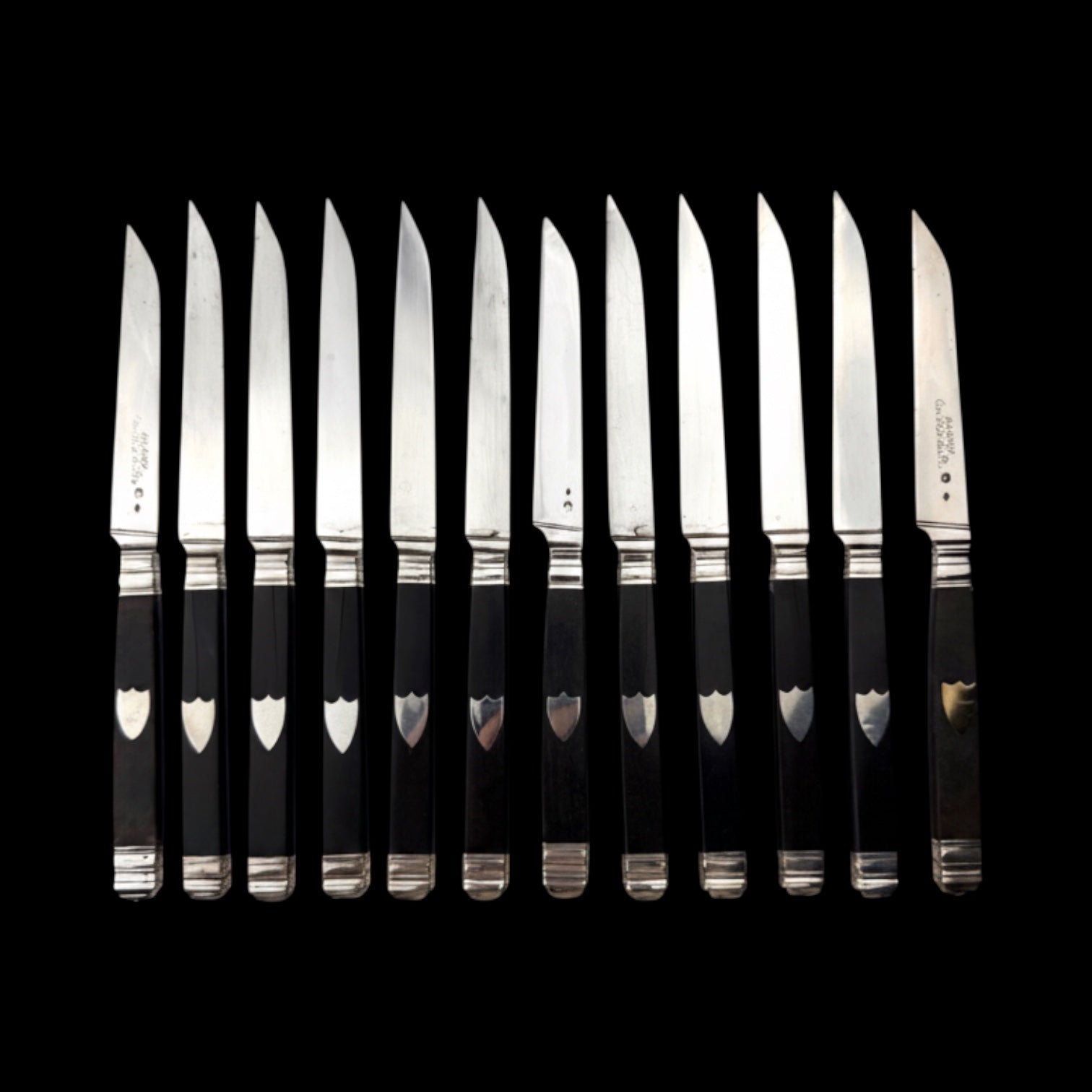 French Ebony and Silver Knife Set. Circa 1830-50. Cased.