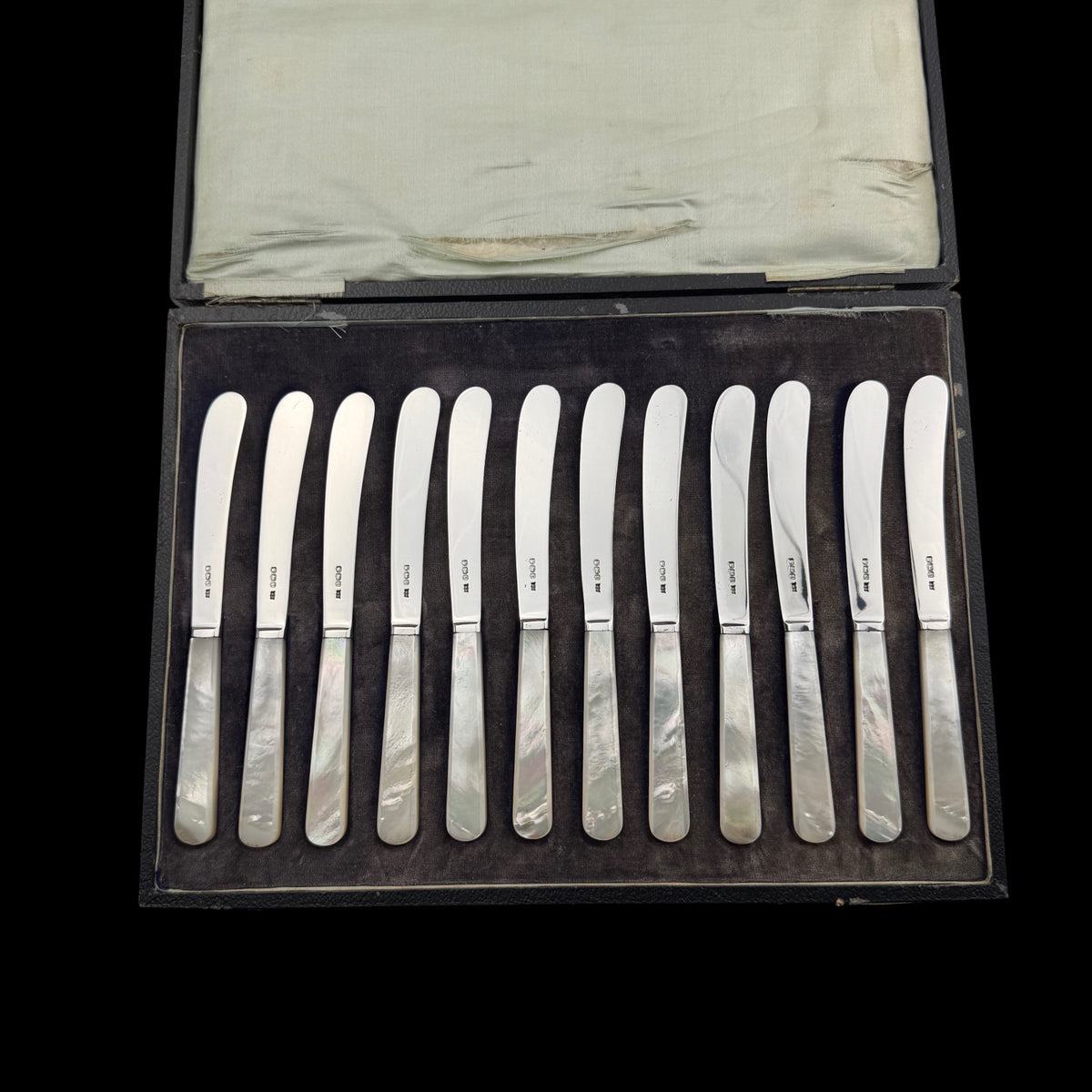Set of 12 Sterling Silver and Mother of Pearl Butter Knives, 1926