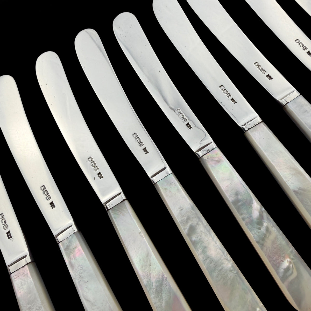 Set of 12 Sterling Silver and Mother of Pearl Butter Knives, 1926
