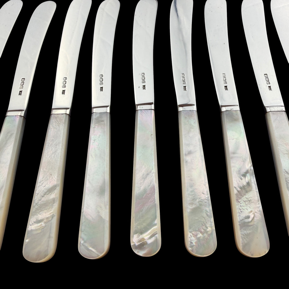 Set of 12 Sterling Silver and Mother of Pearl Butter Knives, 1926