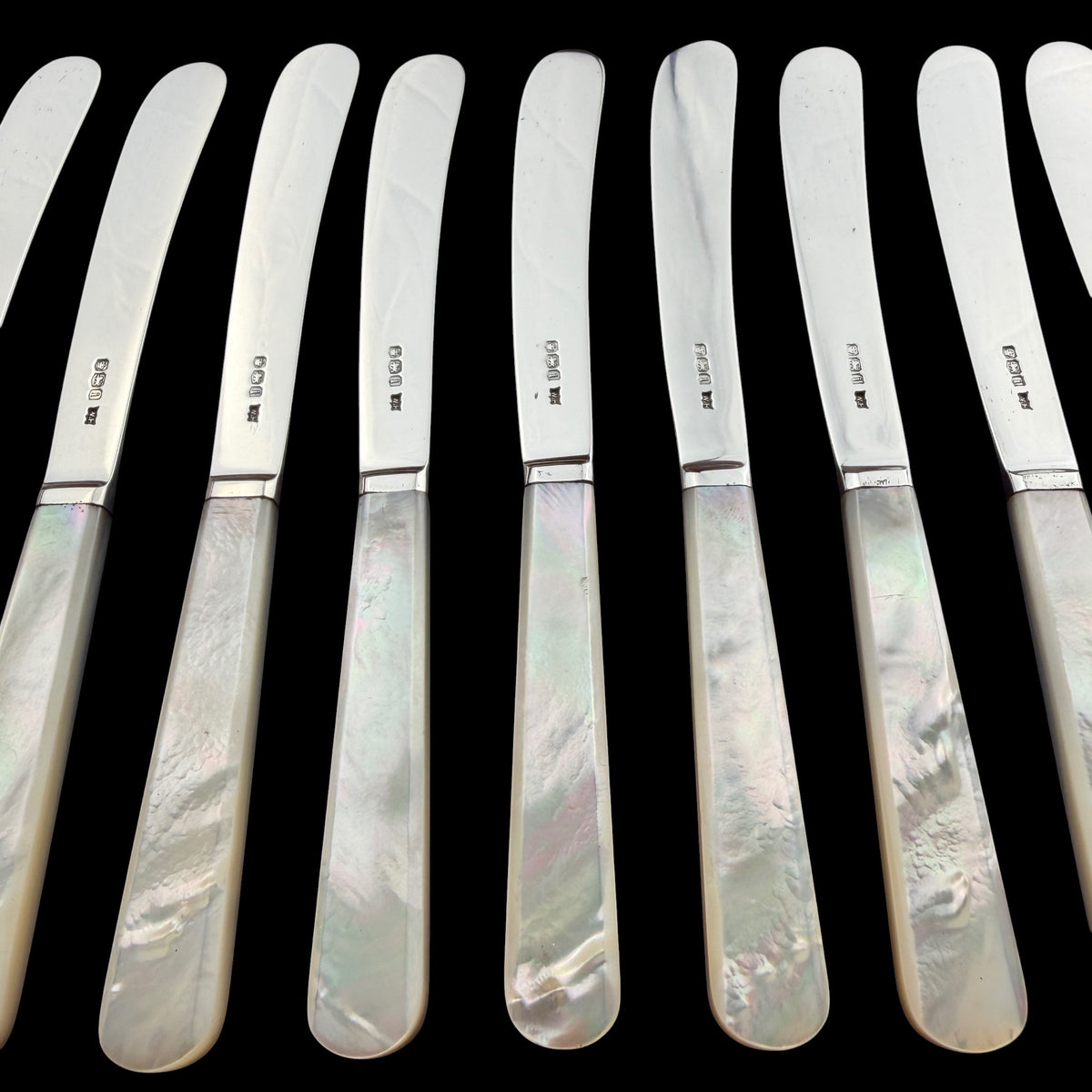 Set of 12 Sterling Silver and Mother of Pearl Butter Knives, 1926