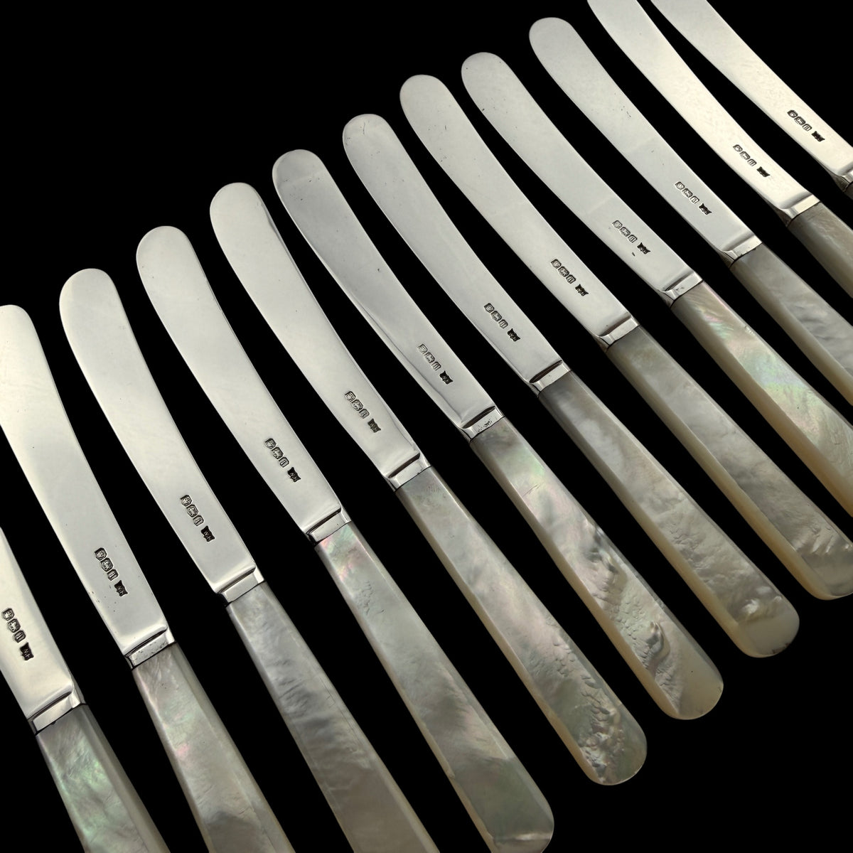 Set of 12 Sterling Silver and Mother of Pearl Butter Knives, 1926