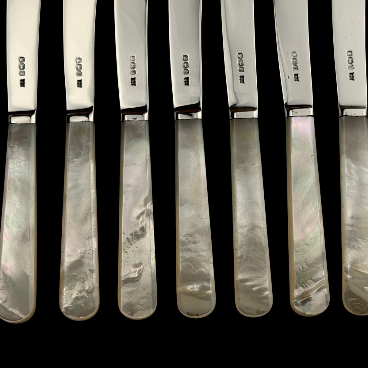 Set of 12 Sterling Silver and Mother of Pearl Butter Knives, 1926