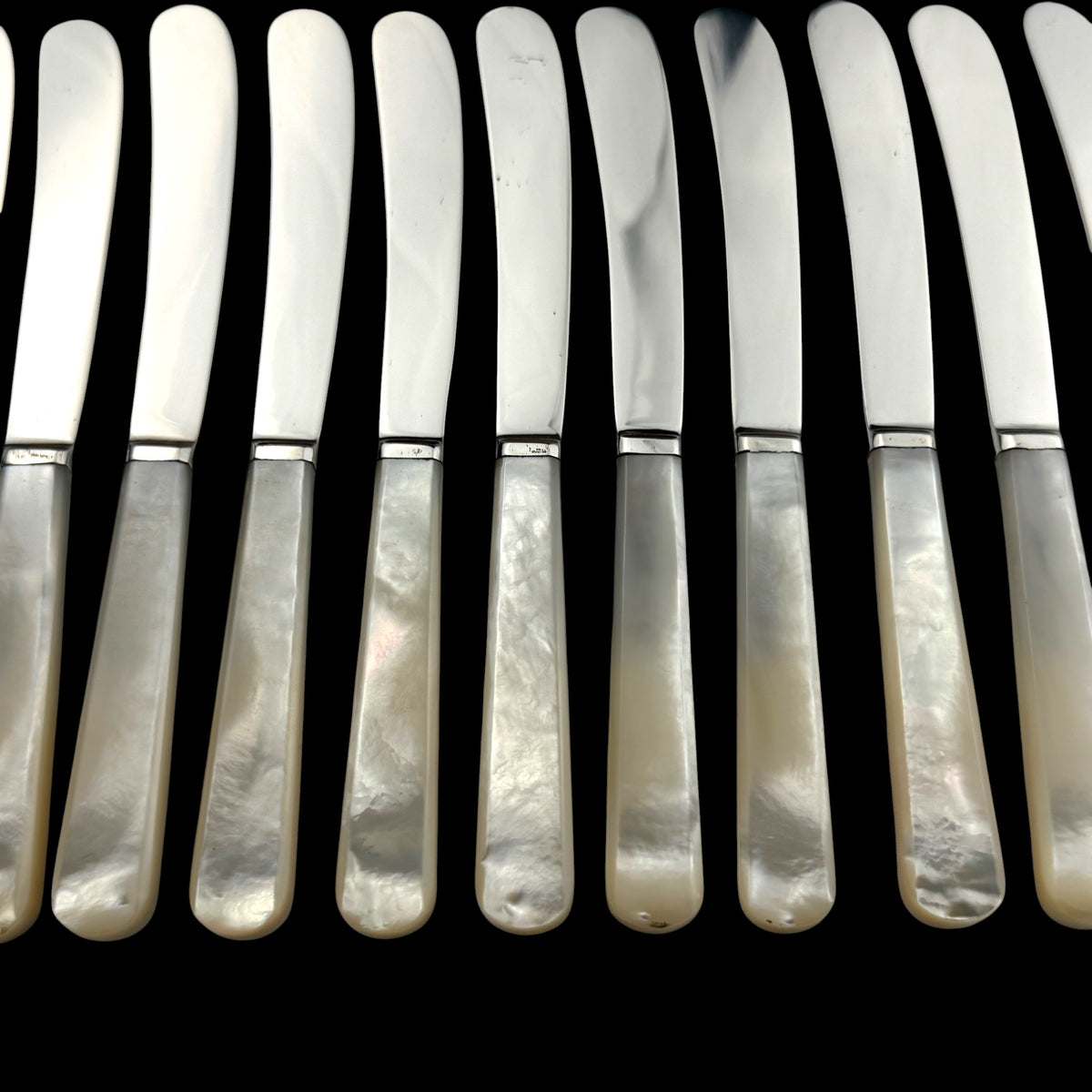 Set of 12 Sterling Silver and Mother of Pearl Butter Knives, 1926