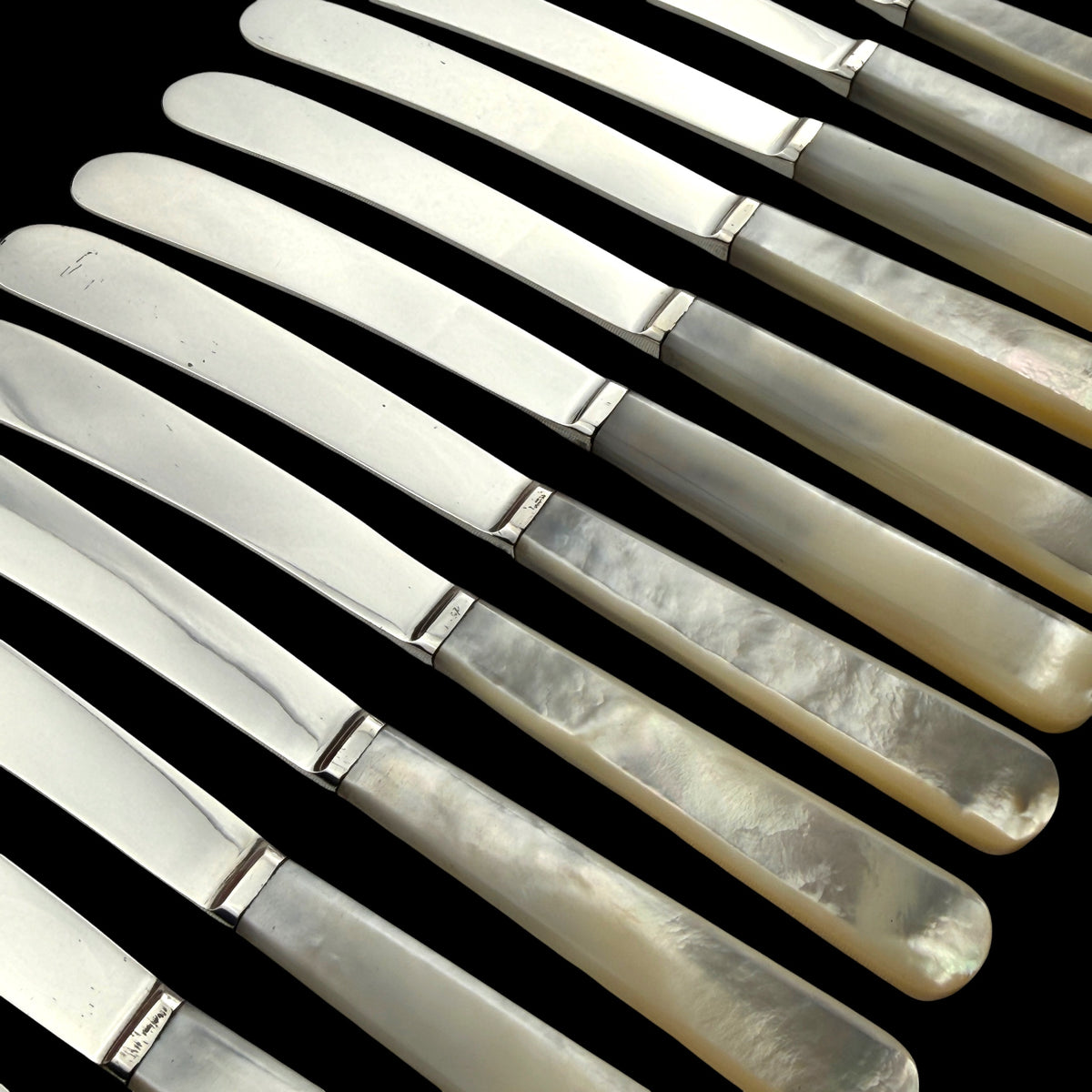Set of 12 Sterling Silver and Mother of Pearl Butter Knives, 1926