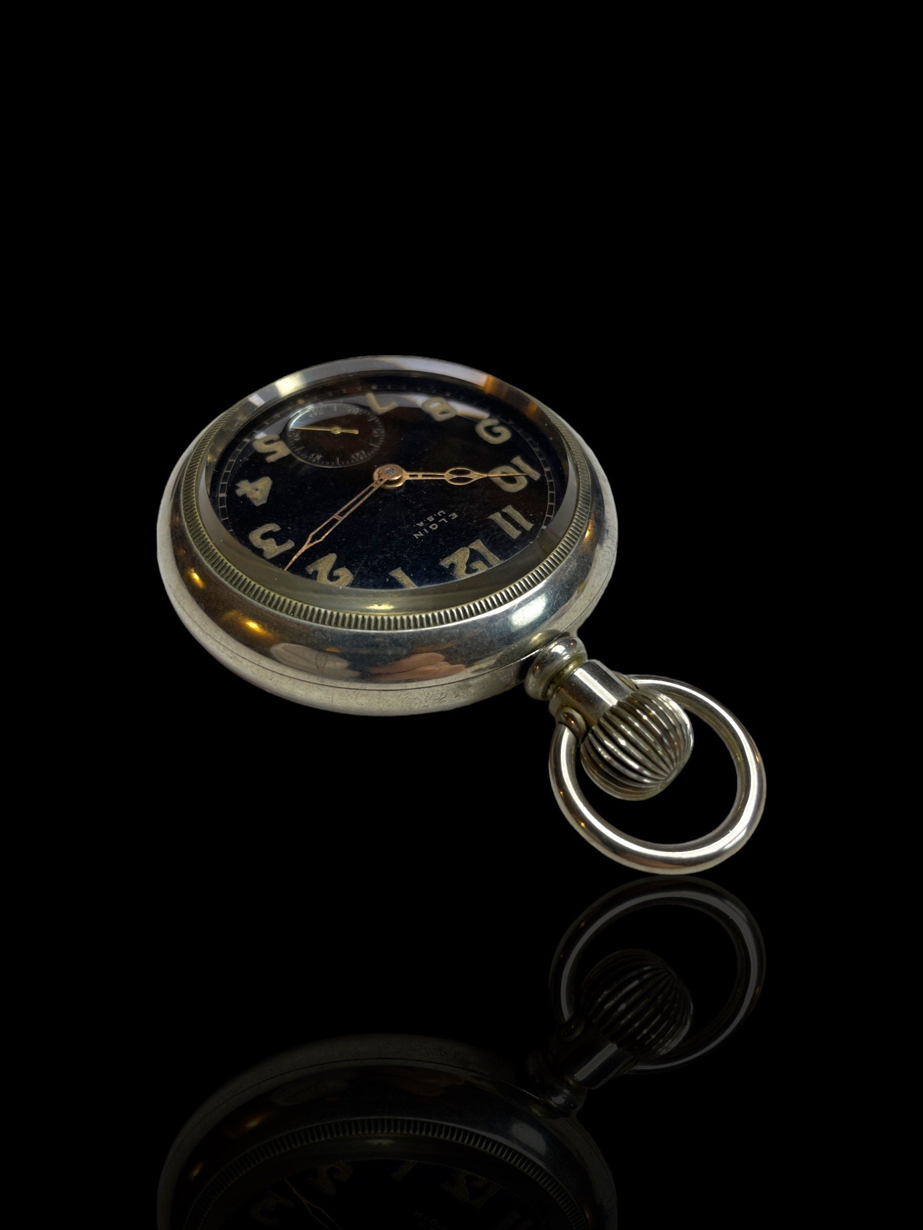 Nickel and Black-faced Elgin Pocket Watch. With Stand.