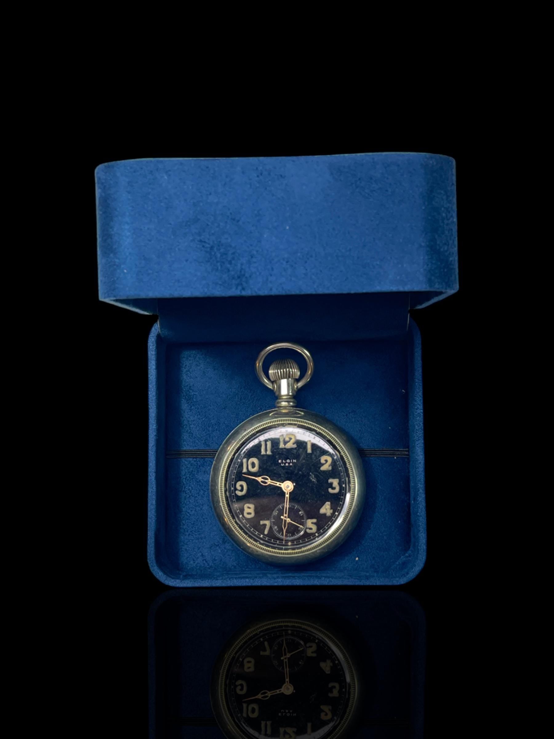 Nickel and Black-faced Elgin Pocket Watch. With Stand.