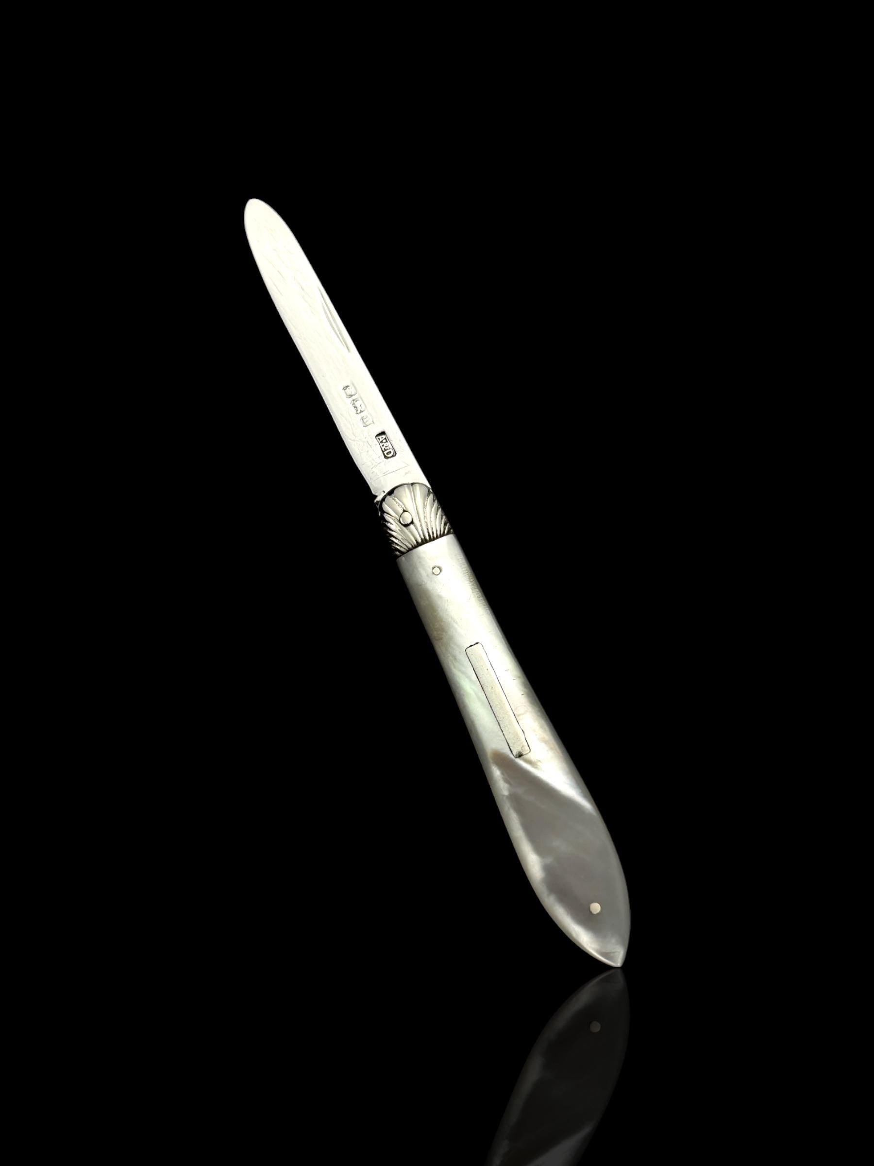 Antique Pocket Knife. 1906, Mother of Pearl and Sterling Silver.