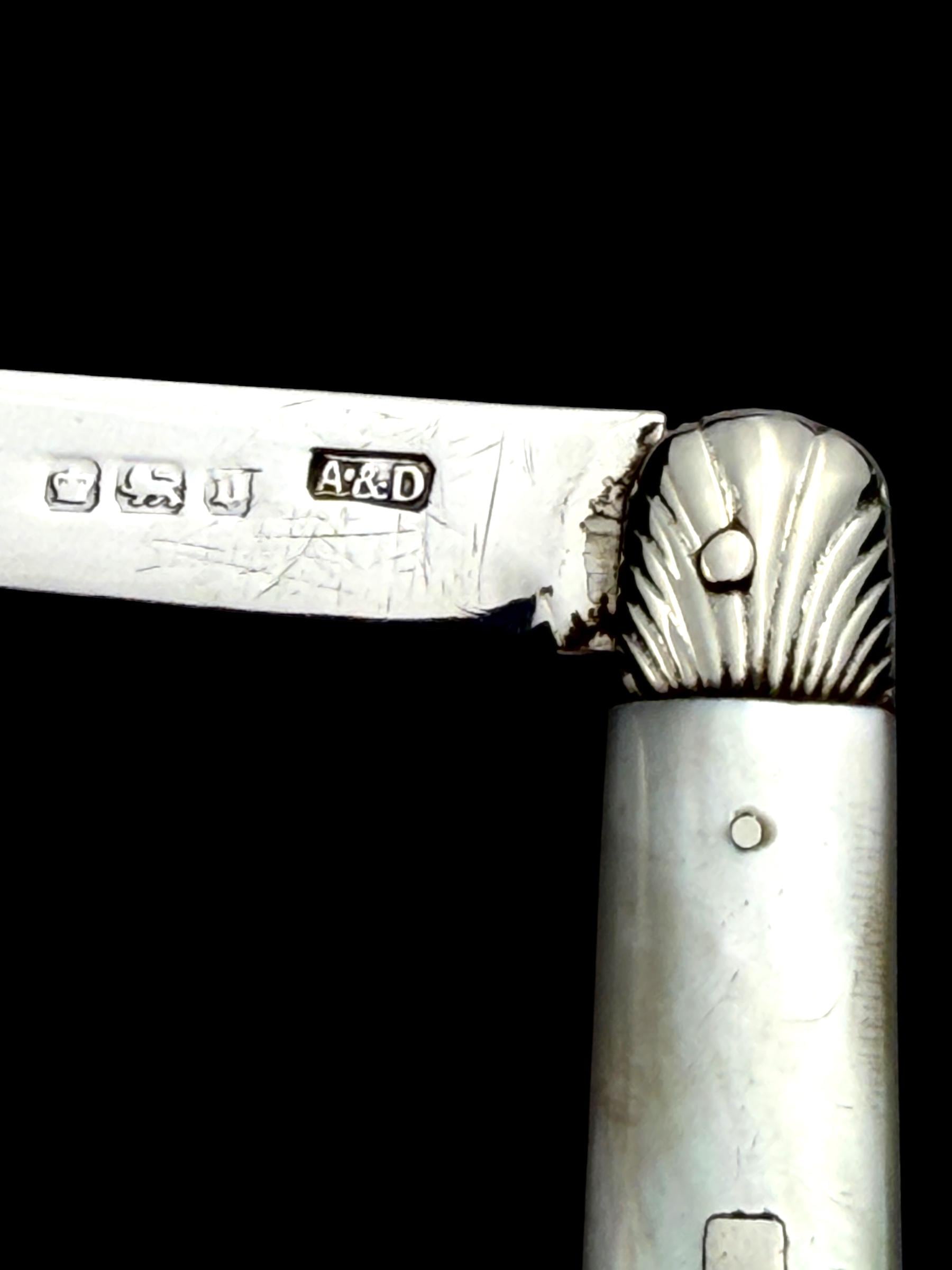 Antique Pocket Knife. 1906, Mother of Pearl and Sterling Silver.