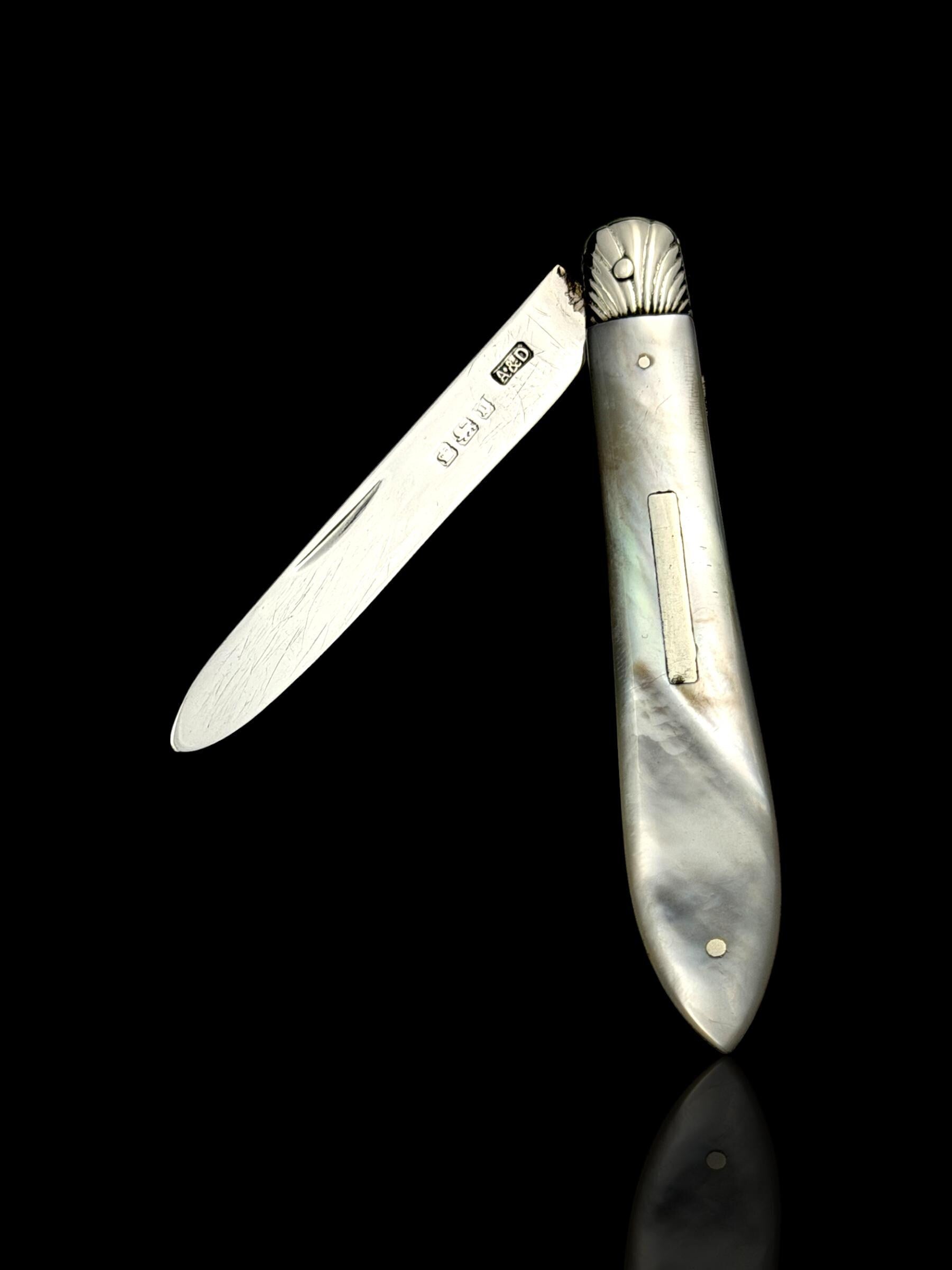 Antique Pocket Knife. 1906, Mother of Pearl and Sterling Silver.