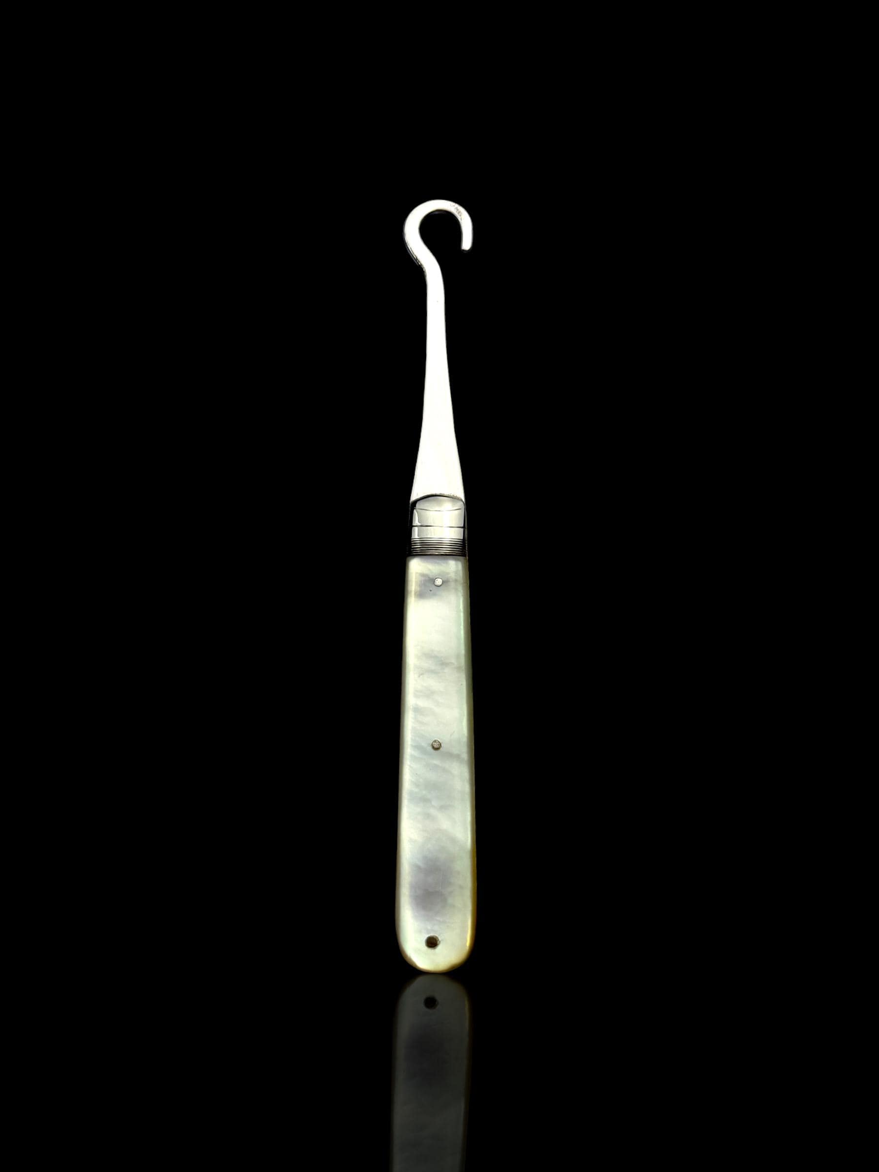 Antique Button Hook. 1908, Mother of Pearl and Sterling Silver.