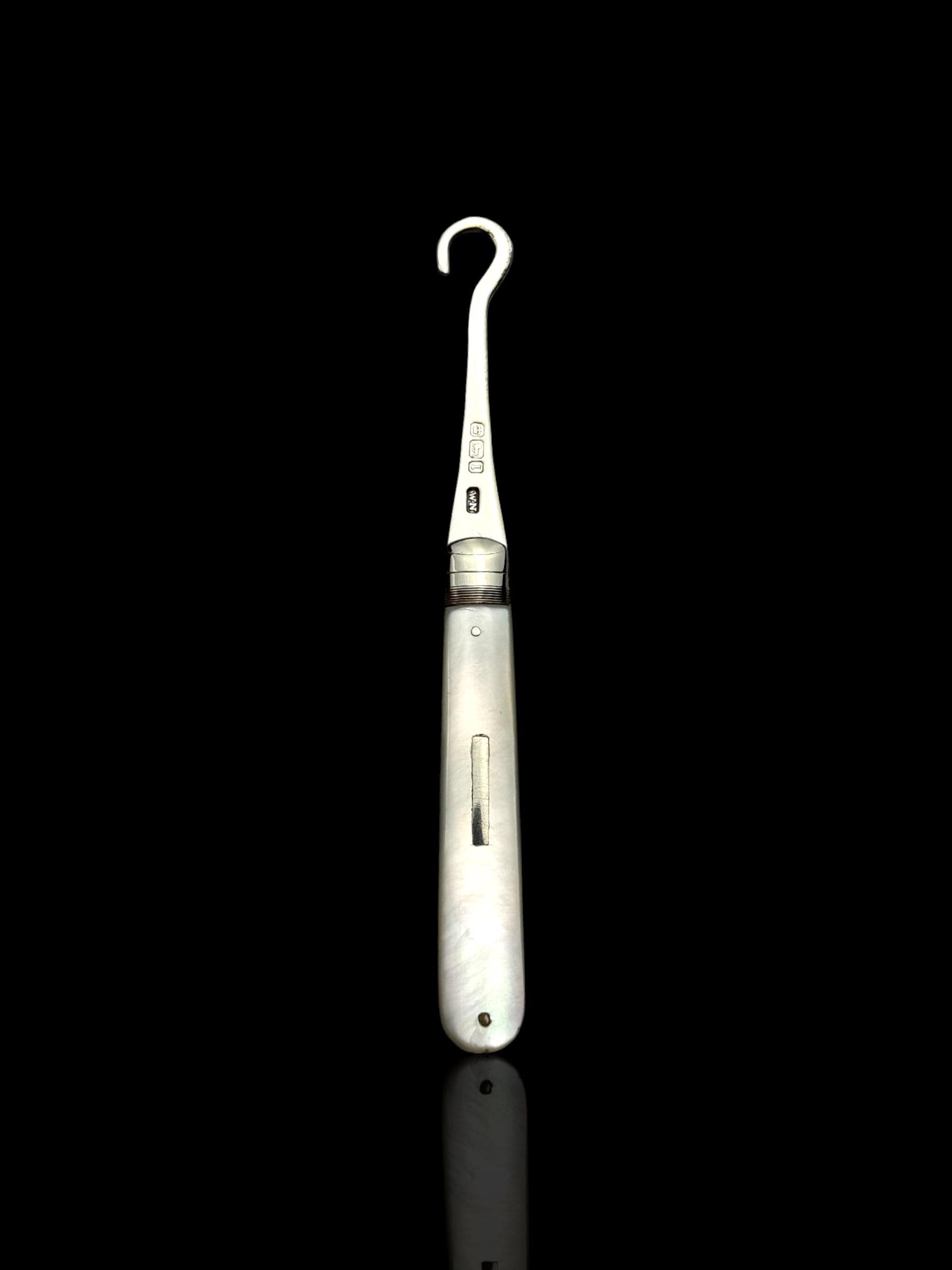 Antique Button Hook. 1908, Mother of Pearl and Sterling Silver.