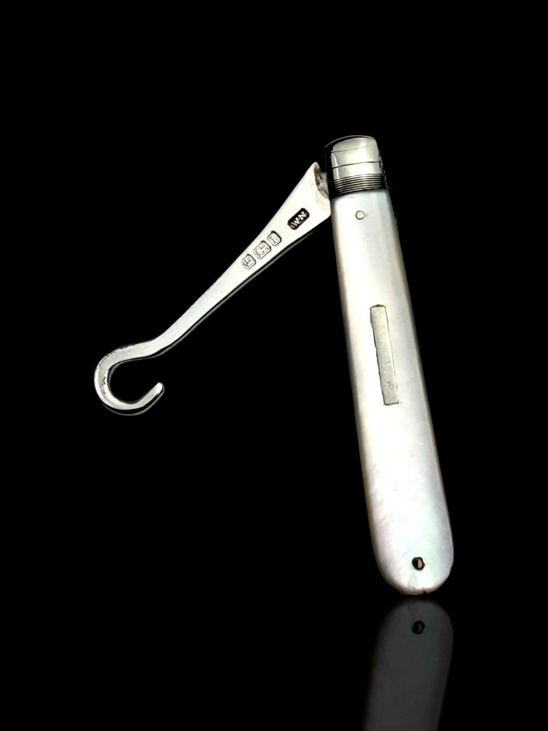 Antique Button Hook. 1908, Mother of Pearl and Sterling Silver.