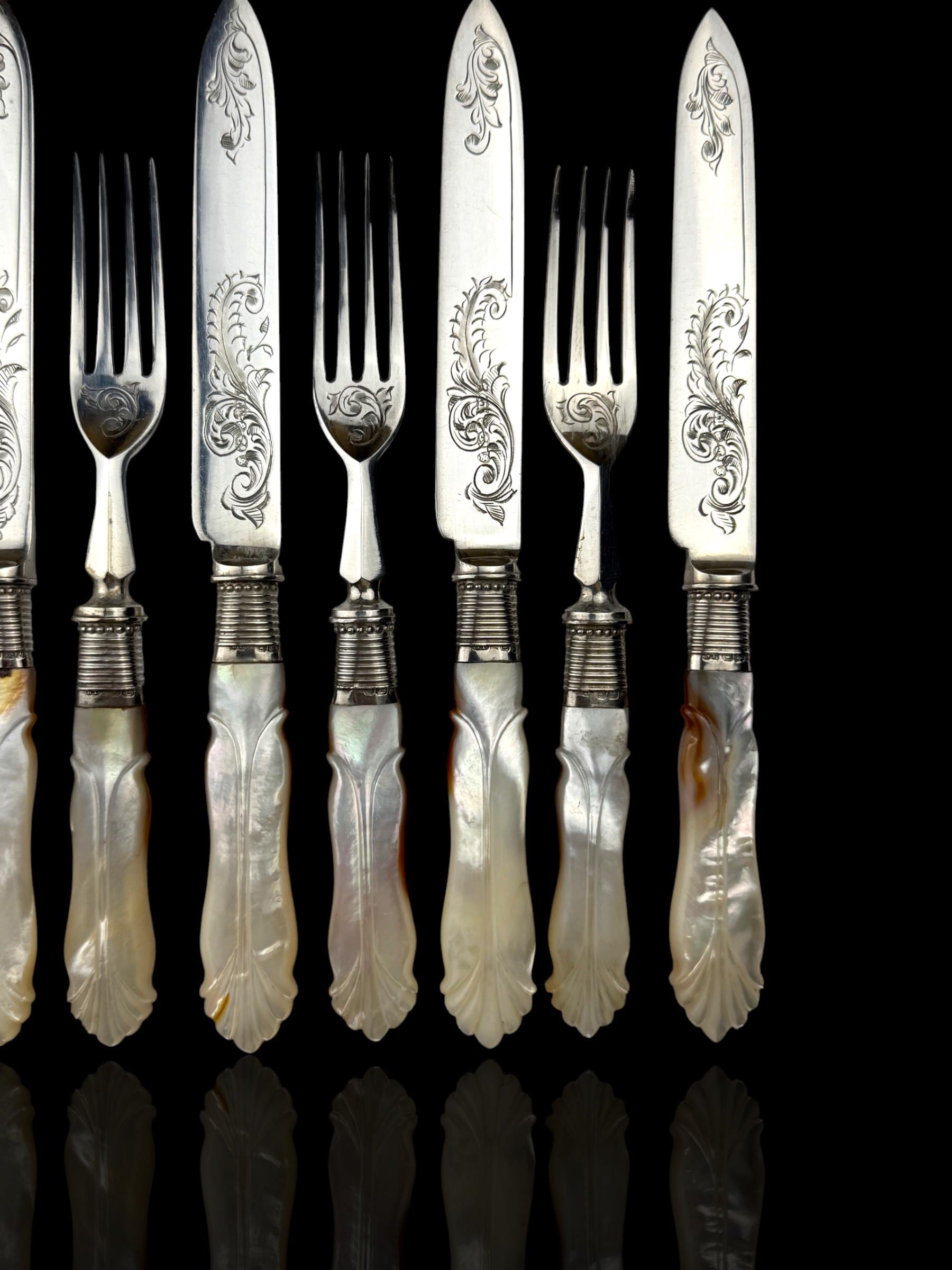 Cutlery Set. Mother of Pearl and Silver Plate. Circa 1900.