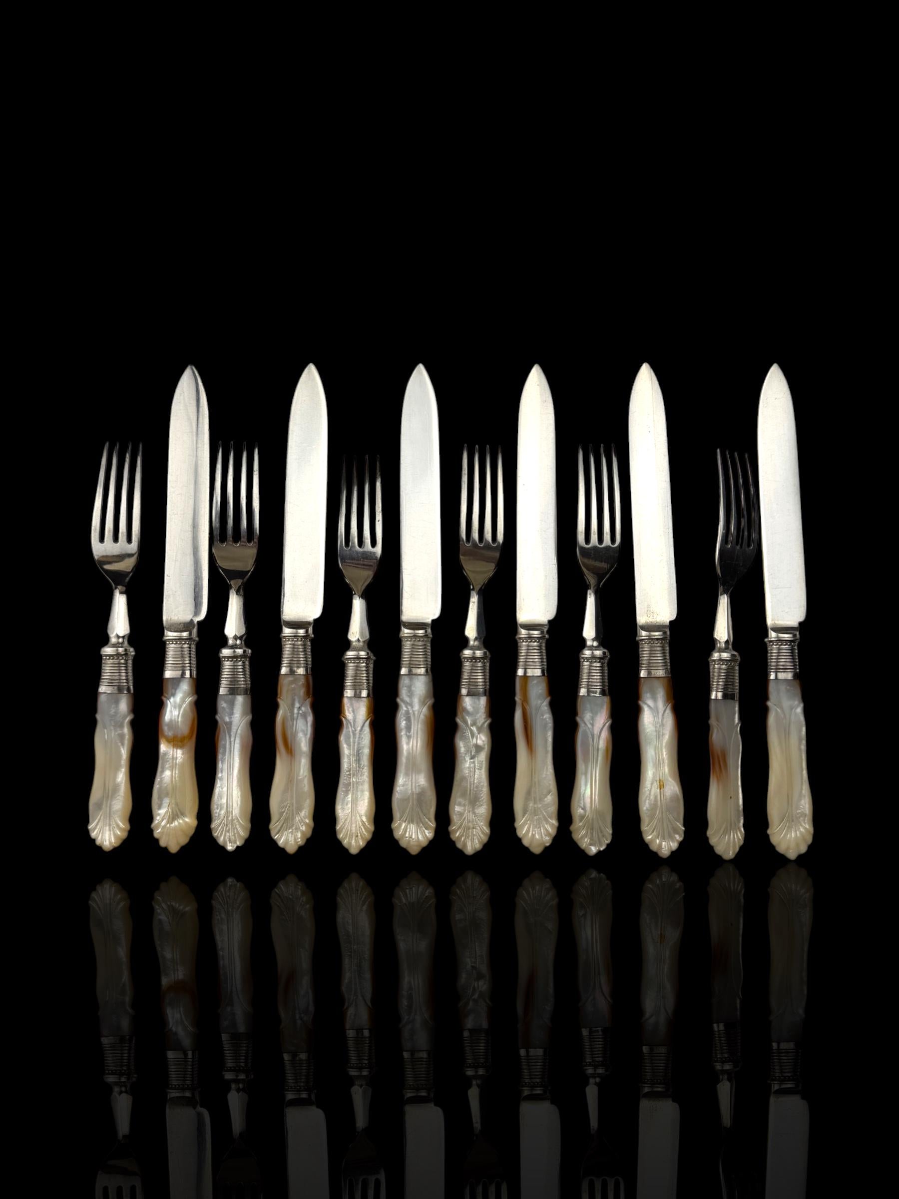 Cutlery Set. Mother of Pearl and Silver Plate. Circa 1900.