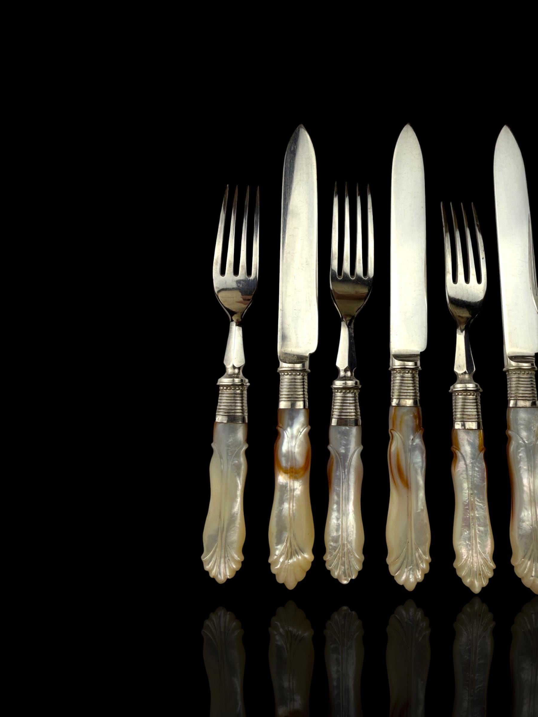 Cutlery Set. Mother of Pearl and Silver Plate. Circa 1900.