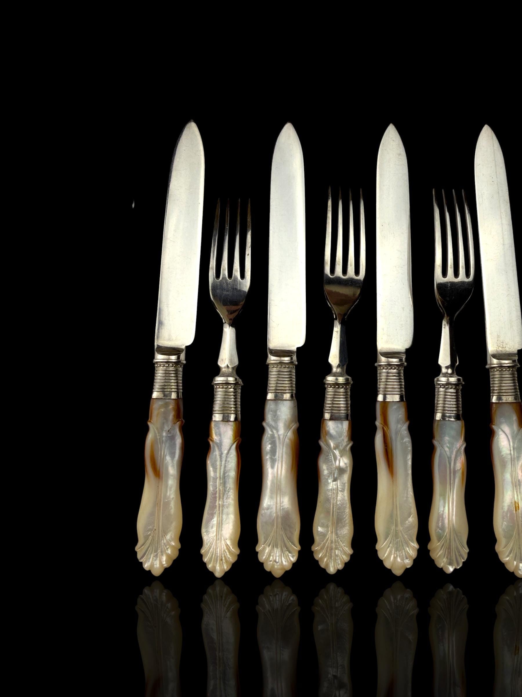 Cutlery Set. Mother of Pearl and Silver Plate. Circa 1900.