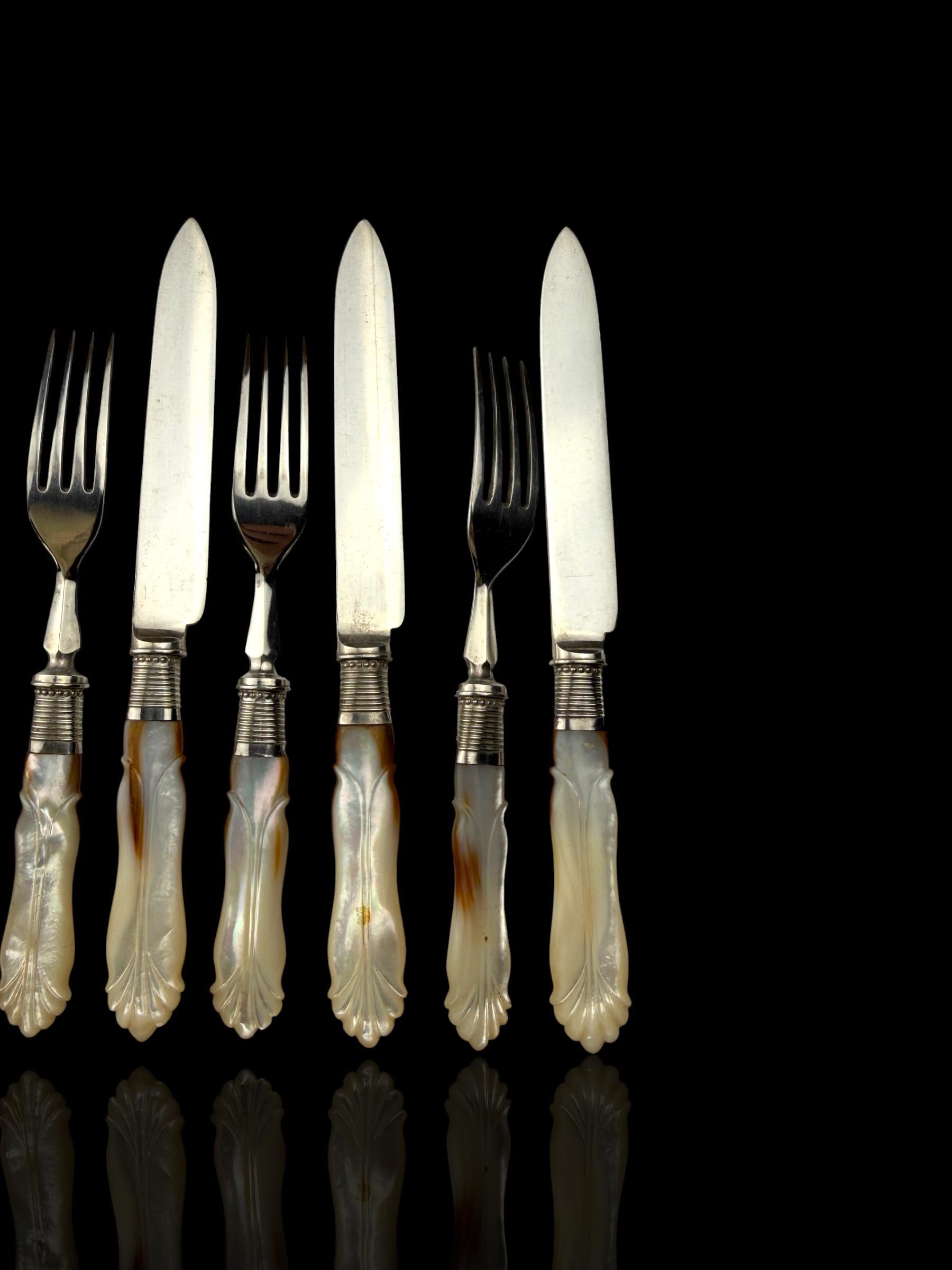 Cutlery Set. Mother of Pearl and Silver Plate. Circa 1900.